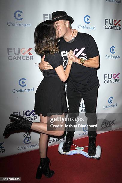 Shira Lazar and Bart Baker arrive at the FCancer Benefit Event at Bootsy Bellows on August 20, 2015 in West Hollywood, California.