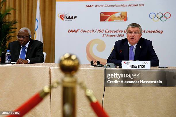 President Thomas Bach attends a press conference with IAAF President Lamine Diack after the IAAF Council and IOC Executive Board meeting at...