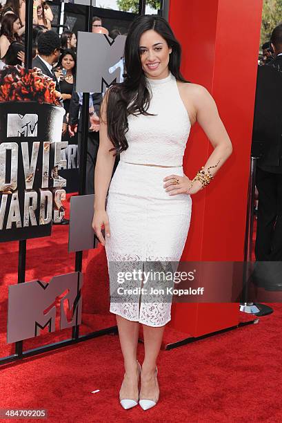 Actress Jeanine Mason arrives at the 2014 MTV Movie Awards at Nokia Theatre L.A. Live on April 13, 2014 in Los Angeles, California.