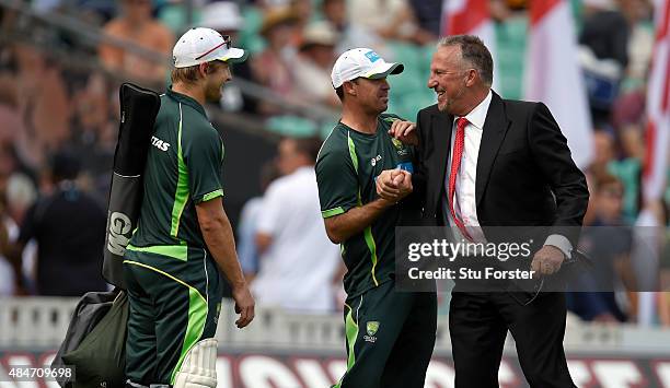 Ian Botham shares a joke with Australia coach Greg Blewett before day two of the 5th Investec Ashes Test match between England and Australia at The...