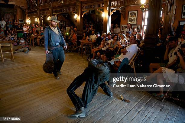 Stunt actors perform during a show for tourists at Fort Bravo/Texas Hollywood on August 20, 2015 in Almeria, Spain. Fort Bravo Texas Hollywood, built...