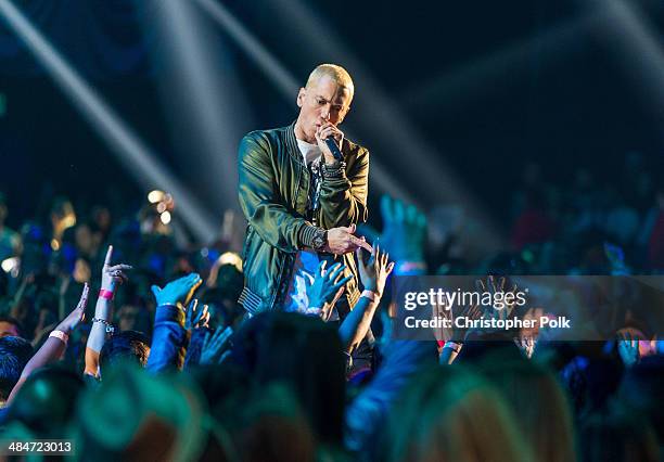 Recording artists Eminem performs onstage at the 2014 MTV Movie Awards at Nokia Theatre L.A. Live on April 13, 2014 in Los Angeles, California.