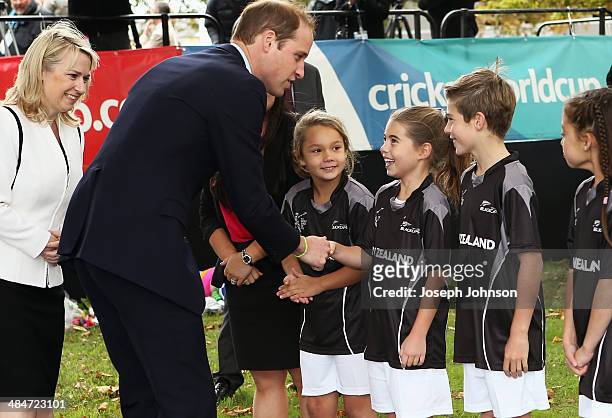 Prince William, Duke of Cambridge, greets young Tayla Fleming during the countdown to the 2015 ICC Cricket World Cup at Latimer Square on April 14,...