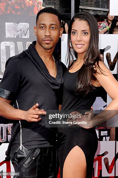 Actor Brandon T. Jackson and Denise Marie Xavier attend the 2014 MTV Movie Awards at Nokia Theatre L.A. Live on April 13, 2014 in Los Angeles,...