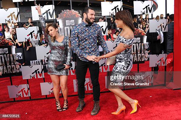 Personalities Camila Nakagawa, Frank Sweeney and Aneesa Ferreira attend the 2014 MTV Movie Awards at Nokia Theatre L.A. Live on April 13, 2014 in Los...