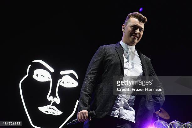 Singer Sam Smith performs with Disclosure onstage during day 3 of the 2014 Coachella Valley Music & Arts Festival at the Empire Polo Club on April...