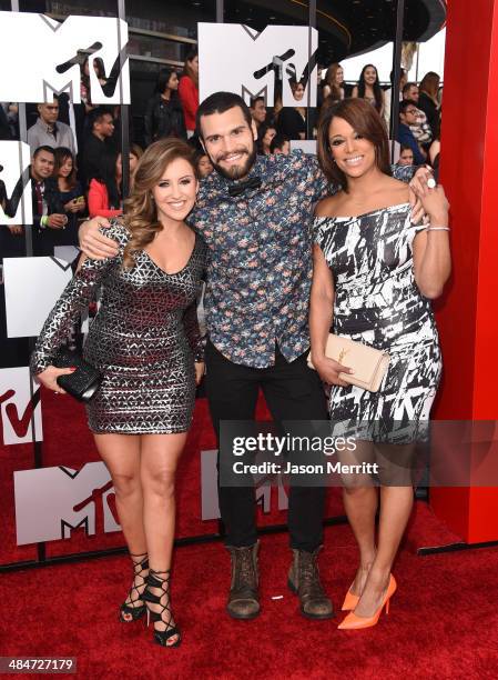 Personalities Camila Nakagawa, Frank Sweeney and Aneesa Ferreira attend the 2014 MTV Movie Awards at Nokia Theatre L.A. Live on April 13, 2014 in Los...