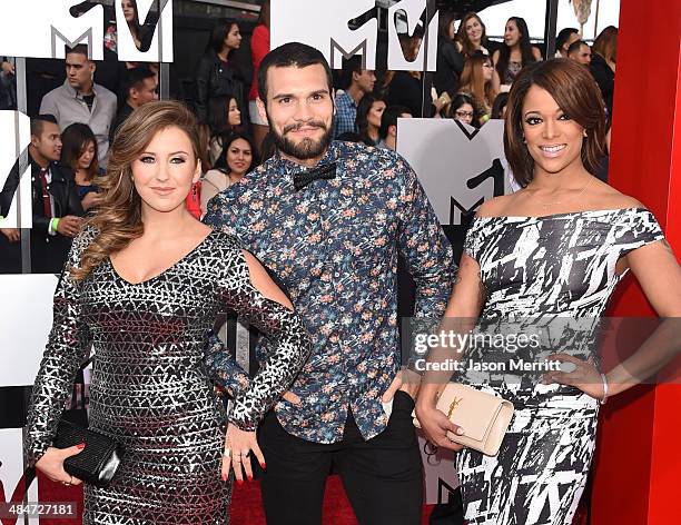 Personalities Camila Nakagawa, Frank Sweeney and Aneesa Ferreira attend the 2014 MTV Movie Awards at Nokia Theatre L.A. Live on April 13, 2014 in Los...