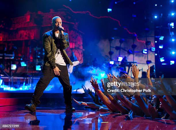 Recording artists Eminem performs onstage at the 2014 MTV Movie Awards at Nokia Theatre L.A. Live on April 13, 2014 in Los Angeles, California.