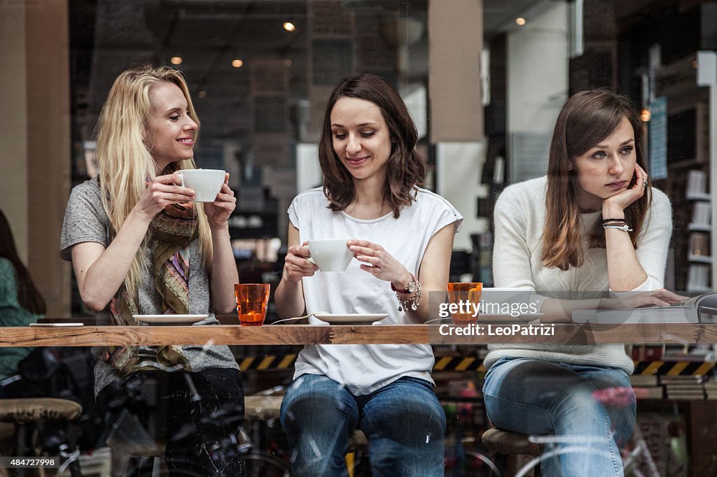 Group of friends relaxing at cafe in Scandinavia