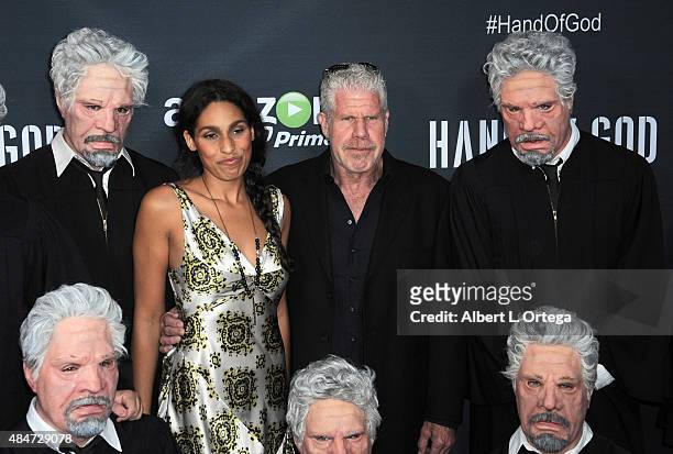 Actor Ron Perlman and daughter/actress Blake Perlman arrive for the Premiere Of Amazon's Series "Hand Of God" held at Ace Theater Downtown LA on...