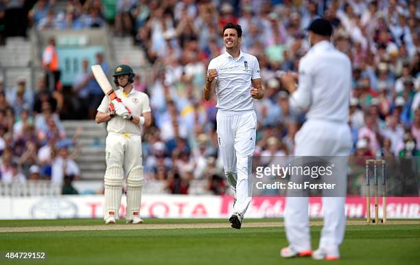England bowler Steven Finn celebrates after dismissing Australia batsman Mitchell Marsh to claim his 100th test wicket during day two of the 5th...