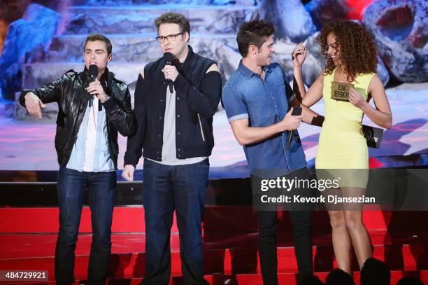 Actors Dave Franco, Seth Rogen, Zac Efron and Tiffany Luce speak onstage at the 2014 MTV Movie Awards at Nokia Theatre L.A. Live on April 13, 2014 in...