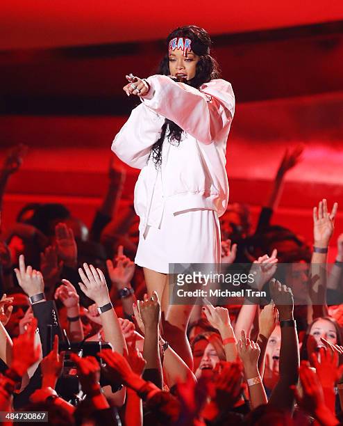 Rihanna performs onstage during the 2014 MTV Movie Awards held at Nokia Theatre L.A. Live on April 13, 2014 in Los Angeles, California.