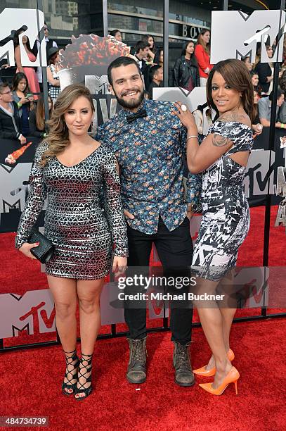 Personalities Camila Nakagawa, Frank Sweeney and Aneesa Ferreira attend the 2014 MTV Movie Awards at Nokia Theatre L.A. Live on April 13, 2014 in Los...