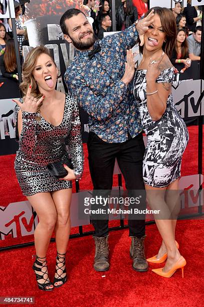 Personalities Camila Nakagawa, Frank Sweeney and Aneesa Ferreira attend the 2014 MTV Movie Awards at Nokia Theatre L.A. Live on April 13, 2014 in Los...