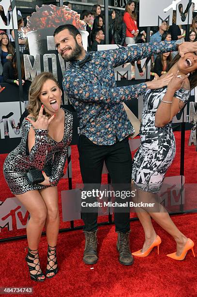 Personalities Camila Nakagawa, Frank Sweeney and Aneesa Ferreira attend the 2014 MTV Movie Awards at Nokia Theatre L.A. Live on April 13, 2014 in Los...