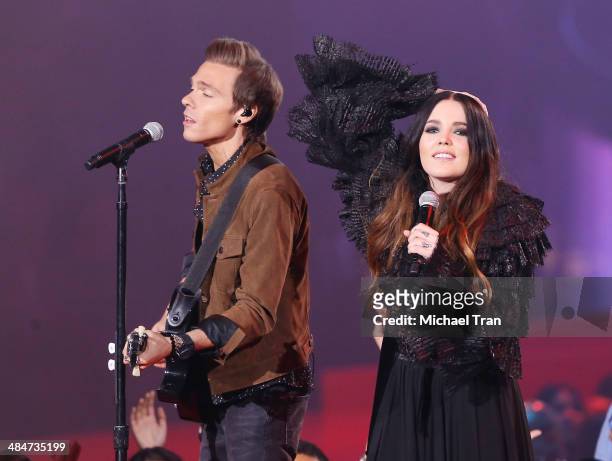 Matthew Koma and Miriam Bryant perform onstage during the 2014 MTV Movie Awards held at Nokia Theatre L.A. Live on April 13, 2014 in Los Angeles,...