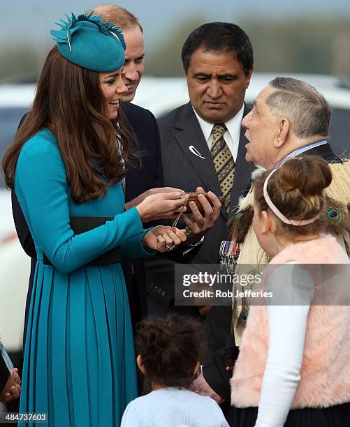 Prince William, Duke of Cambridge and Catherine, Duchess of Cambridge receive gifts at the official greeting at Dunedin International Airport on...