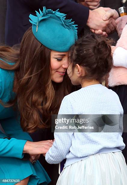 Catherine, Duchess of Cambridge receives a hongi from a young fan at the official greeting at Dunedin International Airport on April 13, 2014 in...