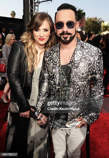 Rochelle Deanna Karidis and musician A.J. McLean attend the 2014 MTV Movie Awards at Nokia Theatre L.A. Live on April 13, 2014 in Los Angeles,...