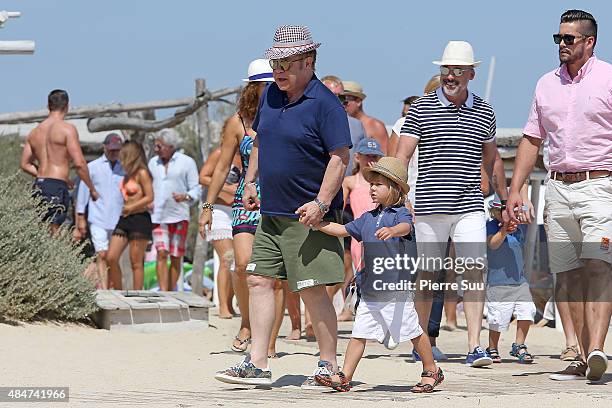 Elton John and David Furnish and their their son Zachary Jackson Levon Furnish-John arrive at 'club55' for lunch on August 21, 2015 in Saint-Tropez,...