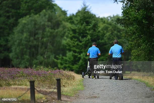 David Ledingham and Richard Punyer of Chestfield Golf Club walk down the 3rd hole during the Golfplan Insurance PGA Pro-Captain Challenge - South...