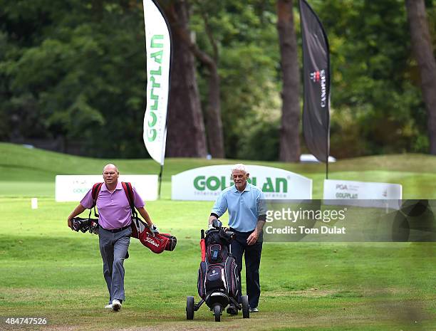 Stuart Rokes and Nigel Fry of Faversham Golf Club walk along the 1st fairway during the Golfplan Insurance PGA Pro-Captain Challenge - South Regional...