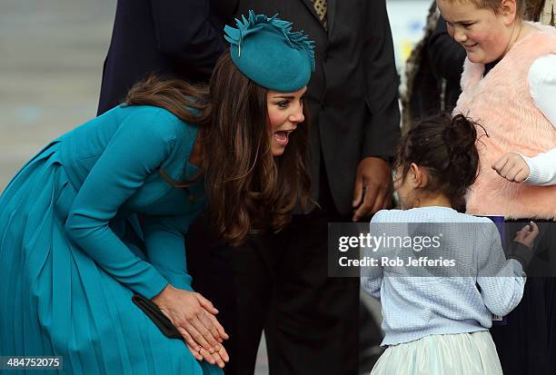 Catherine, Duchess of Cambridge talks to a young fan at the official greeting at Dunedin International Airport on April 13, 2014 in Dunedin, New...