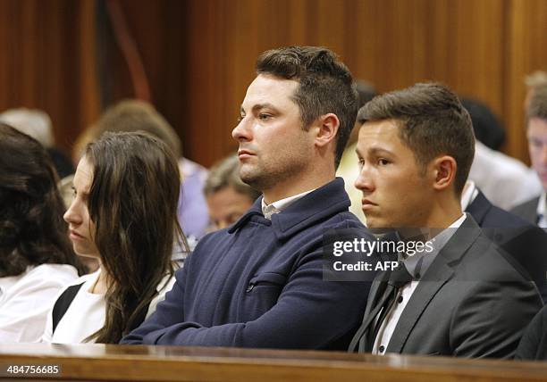 South African Paralympic athlete Oscar Pistorius' brother Carl Pistorius and sister Aimee Pistorius , attend their brother's ongoing murder trial for...