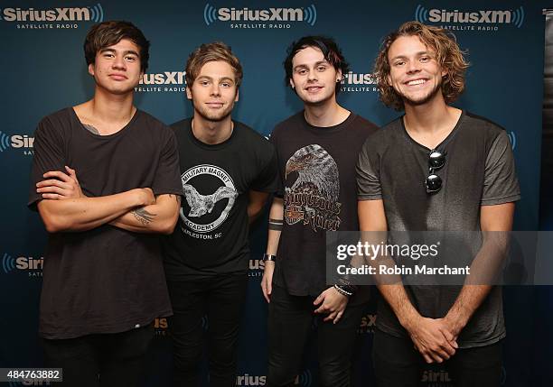 Calum Hood, Luke Hemmings, Michael Clifford and Ashton Irwin of 5 Seconds of Summer visit at SiriusXM Studios on August 21, 2015 in New York City.