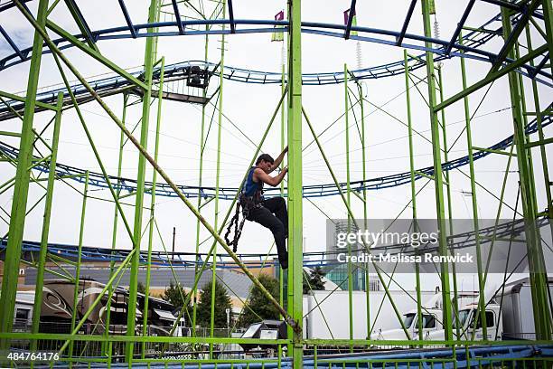 Amusement Park Ride Operator Photos and Premium High Res Pictures ...