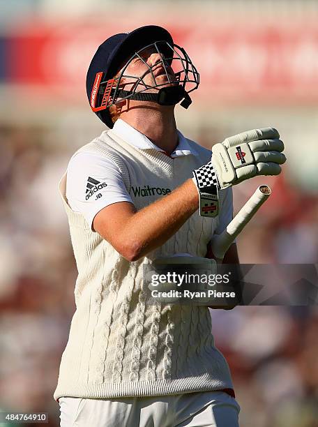 Jonny Bairstow of England looks dejected after being dismissed by Mitchell Johnson of Australia during day two of the 5th Investec Ashes Test match...