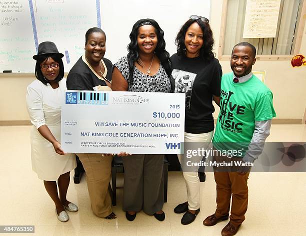 Special Educator Aiash Johnson, Principal Denise O'Connor, Chorus Teacher Bridgette Howell, Timolin Cole, and Trell Thomas attend Vh1 Save The Music...