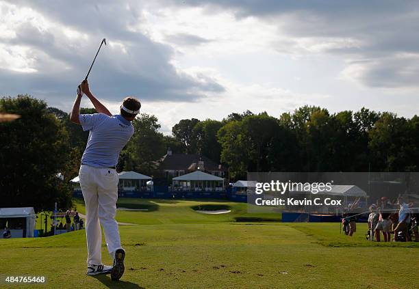 Davis Love III tees off on the 16th hole during the second round of the Wyndham Championship at Sedgefield Country Club on August 21, 2015 in...