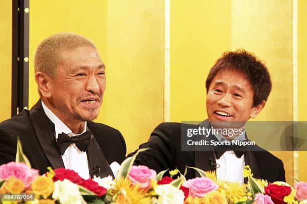 Hitoshi Matsumoto and Masatoshi Hamada of comedy duo Downtown attend NTV year end special program "Gaki No Tsukai Special - 24 Hours No Laughing"...