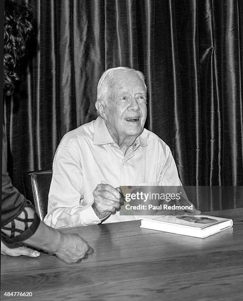 July 30: Former President Jimmy Carter at a book signing for 'A Full Life: Reflections At Ninety' at Vroman's Bookstore on July 30, 2015 in Pasadena,...