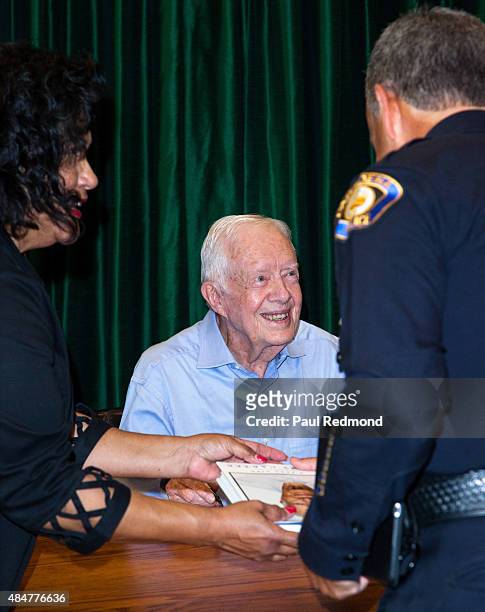 Former President Jimmy Carter at a book signing for 'A Full Life: Reflections At Ninety' at Vroman's Bookstore on July 30, 2015 in Pasadena,...