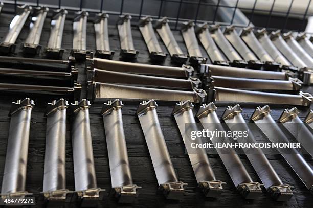 TiAi turbine blades for the new jet engine LEAP of SNECMA , are pictured on April 14, 2014 at the Mecachrome plant in Sable-Sur-Sarthe, western...