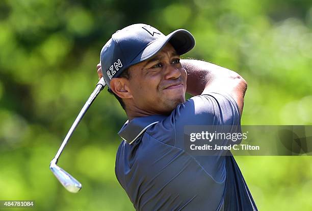 Tiger Woods tees off the eighth hole during the second round of the Wyndham Championship at Sedgefield Country Club on August 21, 2015 in Greensboro,...