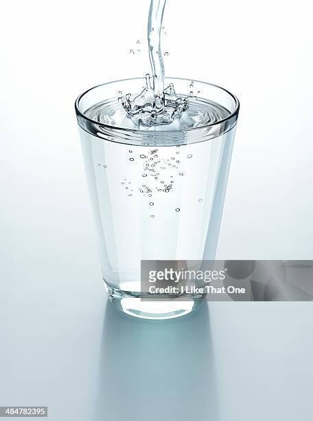 drinking glass of water - drinking glass stock pictures, royalty-free photos & images