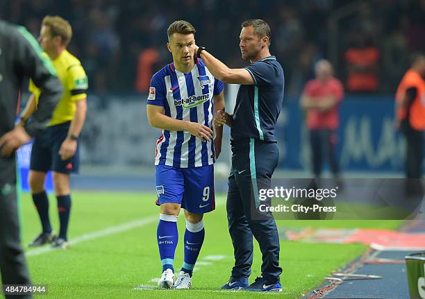 Alexander Baumjohann and coach Pal Dardai of Hertha BSC during the game between Hertha BSC and Werder Bremen on August 21, 2015 in Berlin, Germany.