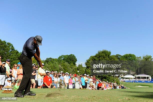 Tiger Woods tees off on the 16th hole during the second round of the Wyndham Championship at Sedgefield Country Club on August 21, 2015 in...