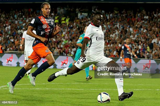 Jean Kevin Augustin and Daniel Congre in action during the French Ligue 1 match between Paris Saint Germain and Montpellier Herault at Stade de la...