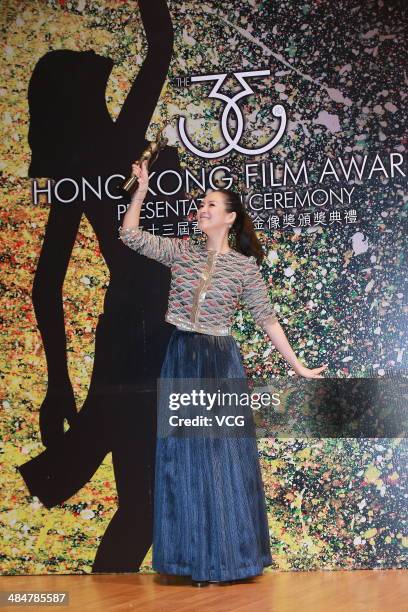 Actress Zhang Ziyi holds the trophy during the 33rd Hong Kong Film Awards red carpet on April 13, 2014 in Hong Kong, Hong Kong.