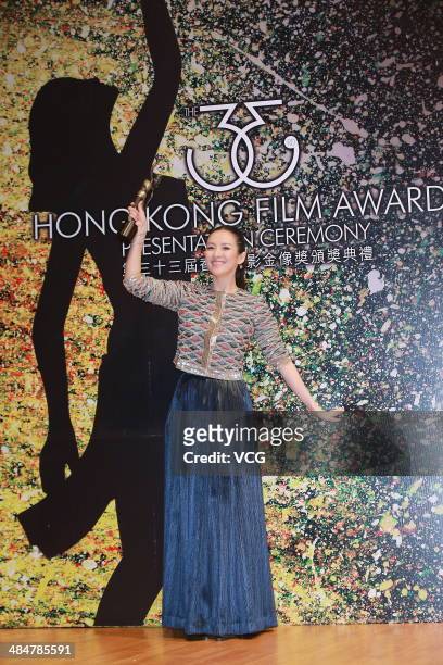 Actress Zhang Ziyi holds the trophy during the 33rd Hong Kong Film Awards red carpet on April 13, 2014 in Hong Kong, Hong Kong.