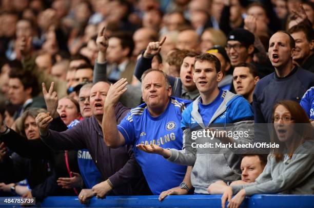 Angry Chelsea fans gesture at the linesman during the Barclays Premier League match between Chelsea and Stoke City at Stamford Bridge on April 5,...