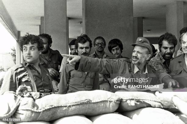 Palestinian leader Yasser Arafat is seen among his militants in Beirut during the early days of the 1982 Israeli invasion of Lebanon. Arafat, the...