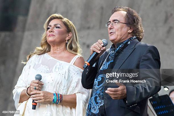 Singer Romina Power and Al Bano perform live during a concert at the Waldbuehne on August 21, 2015 in Berlin, Germany.