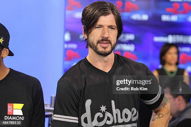 Professional skateboarder Chris Cole of Street League Skateboarding rings the NASDAQ Closing Bell at NASDAQ MarketSite on August 21, 2015 in New York...